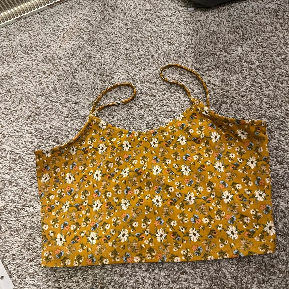Yellow with white flowers top